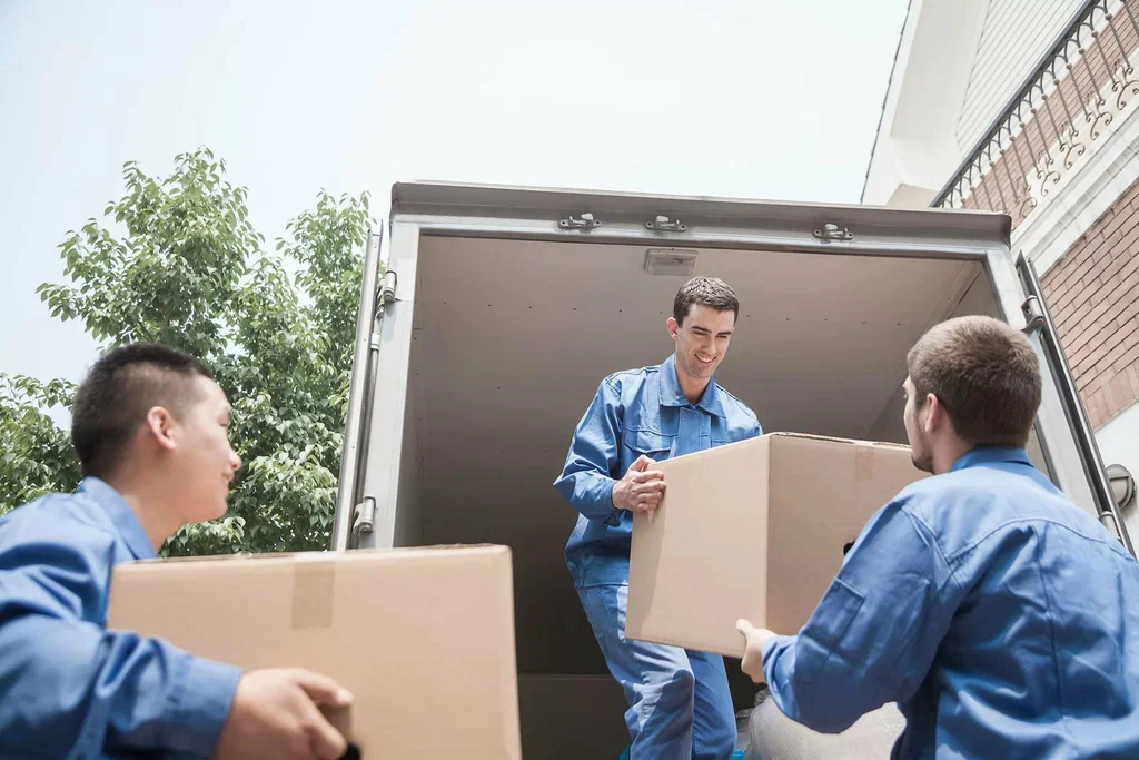 Wheat Ridge Movers professional movers carrying furniture